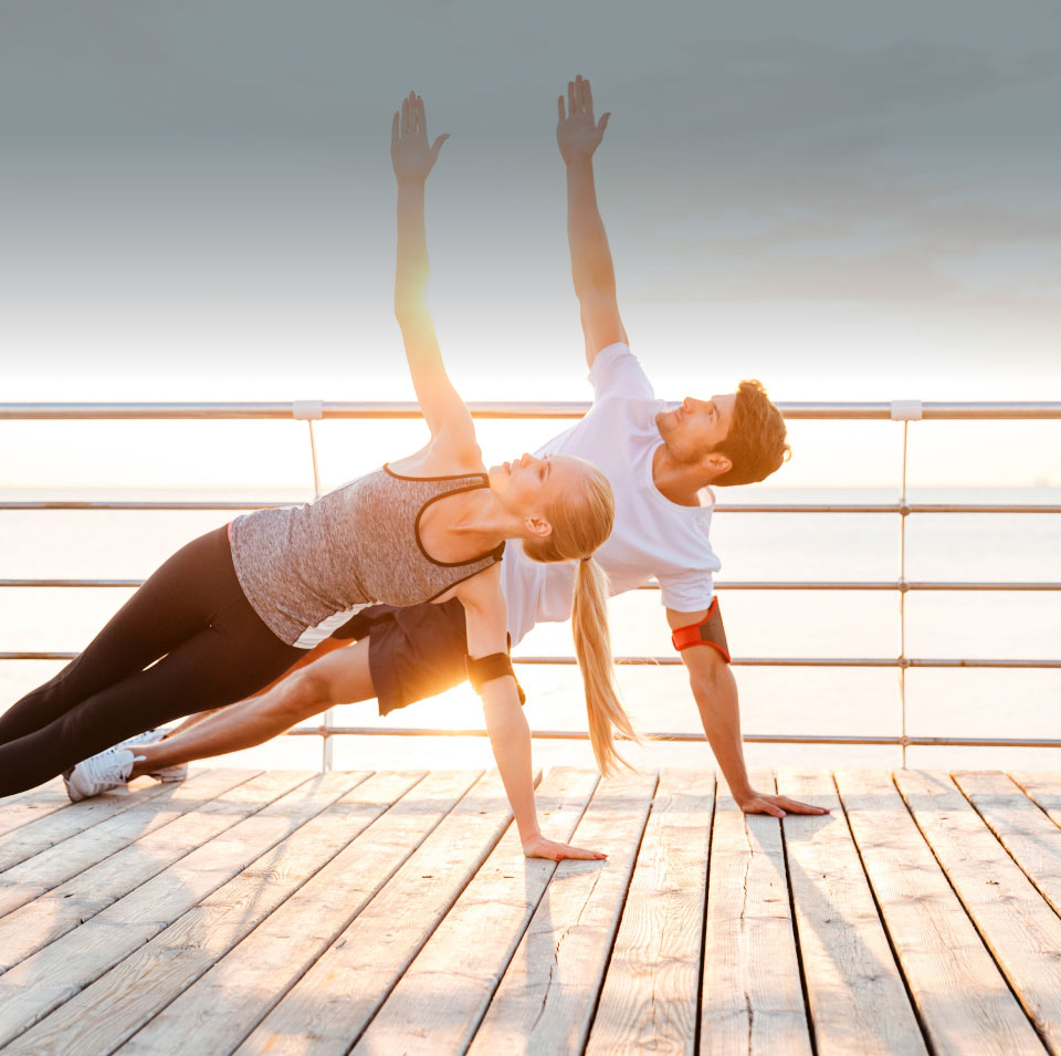 couple practicing yoga modeling bodytite results