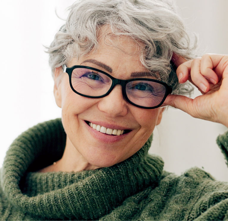 mishawaka woman with glasses modeling facelift results
