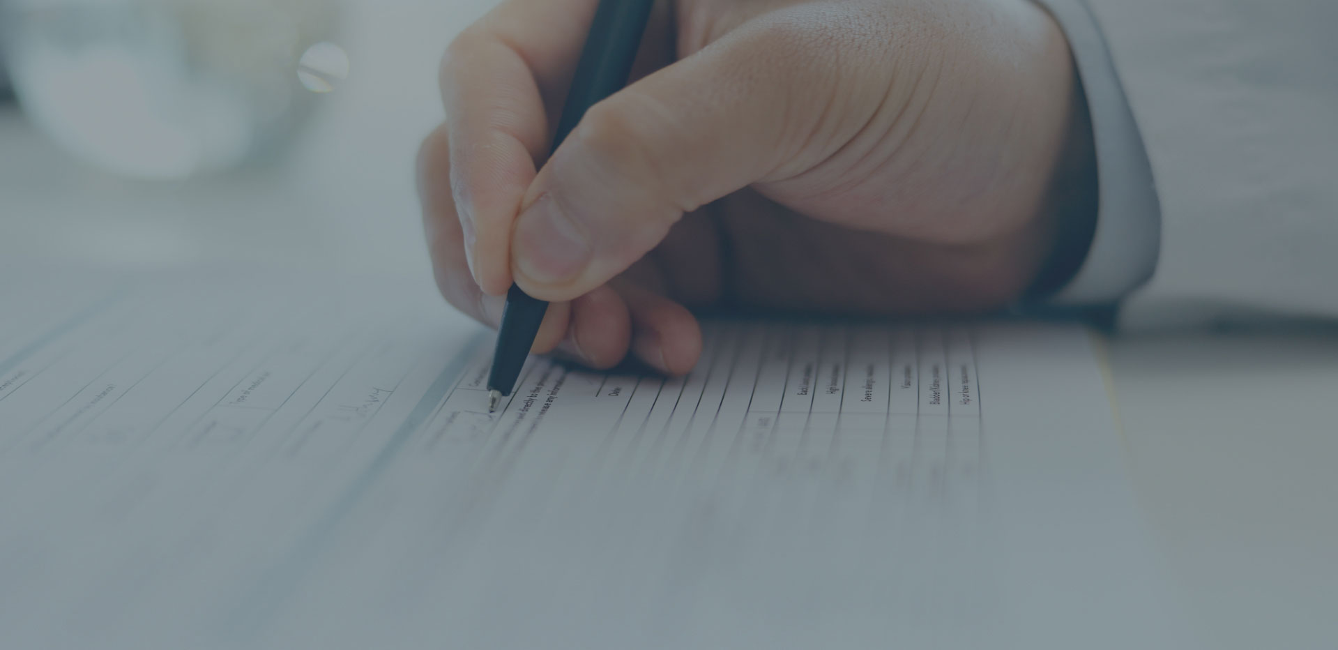 doctor filling out chart