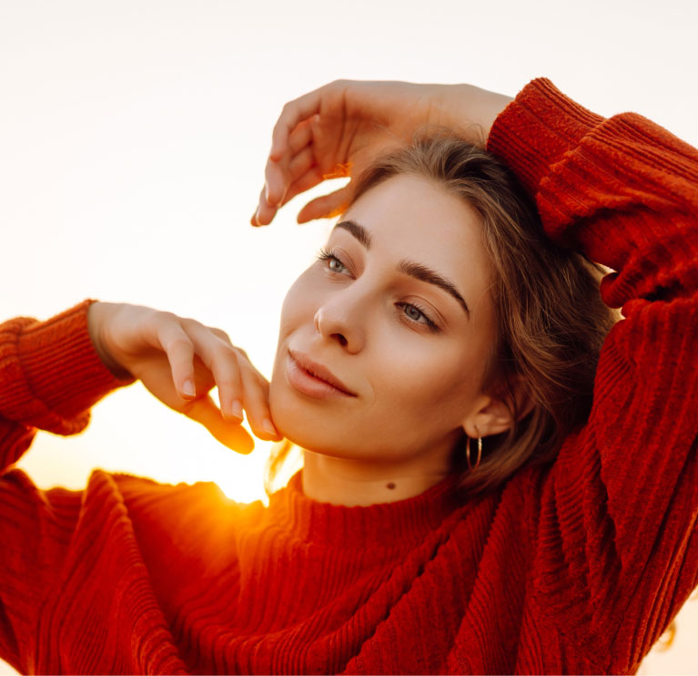 xeomin model in front of sunset in mishawaka